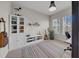 Office space with natural light, built-in shelving, and a work desk at 7133 Hatpin Loop, Wesley Chapel, FL 33545