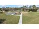 Community playground provides a safe and fun area for children to play and socialize at 7133 Hatpin Loop, Wesley Chapel, FL 33545