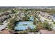 Aerial view of the community tennis courts offering a great space for recreation and fitness at 7133 Hatpin Loop, Wesley Chapel, FL 33545