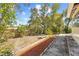 Backyard featuring wood mulch, grass, and plenty of trees at 7183 Fireside St, Spring Hill, FL 34606