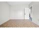 Bedroom with tile floor and neutral walls provides a serene space at 7183 Fireside St, Spring Hill, FL 34606