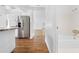 Bright home interior showcasing the updated kitchen with modern appliances and hardwood floors at 7183 Fireside St, Spring Hill, FL 34606