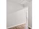 Hallway with wood-look flooring, and a door leading to another room at 801 Chess Pl, Seffner, FL 33584