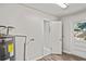 Functional laundry area with water heater, hookups and utility door to the exterior at 801 Chess Pl, Seffner, FL 33584