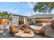 Backyard featuring a shed, a carport and a seating area at 810 22Nd N St, St Petersburg, FL 33713