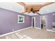 Bedroom with a decorative ceiling fan, hardwood floors, natural light, and a connected full bath at 810 22Nd N St, St Petersburg, FL 33713