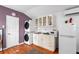 Kitchen area featuring white cabinets, stainless steel sink and appliances at 810 22Nd N St, St Petersburg, FL 33713