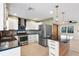 Modern kitchen with stainless steel appliances, granite countertops, and white cabinets at 810 22Nd N St, St Petersburg, FL 33713