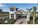 Welcome to the community, which offers a staffed gate and welcoming landscaping at 8724 Ocean Tides Cv, Parrish, FL 34219