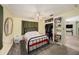 Bedroom featuring neutral walls, a ceiling fan, closet, and decorative mirror at 9048 94Th St, Seminole, FL 33777