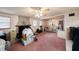Spacious living room featuring a brick fireplace and lots of natural light at 9048 94Th St, Seminole, FL 33777