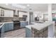 Modern kitchen with stainless steel appliances and white and gray cabinets at 917 Silver Ridge Way, Valrico, FL 33594