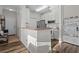 Efficient kitchen featuring modern appliances and a breakfast bar with room for seating at 10201 Courtney Palms Blvd # 204, Tampa, FL 33619
