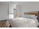 Calm main bedroom with a comfortable bed and an en-suite bathroom at 10201 Courtney Palms Blvd # 204, Tampa, FL 33619