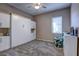 Spare bedroom featuring custom built-in cabinets and a pull down Murphy bed at 11424 Drifting Leaf Dr, Riverview, FL 33579