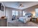 Bedroom featuring neutral walls, carpet floors, and a ceiling fan at 11424 Drifting Leaf Dr, Riverview, FL 33579