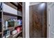 Built-in closet featuring dark wood, providing ample storage space in the home at 11424 Drifting Leaf Dr, Riverview, FL 33579