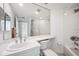 Bathroom with a large mirror, a single sink, and tiled shower/tub combination at 1200 Country Club Dr # 2206, Largo, FL 33771