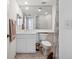 The bathroom is equipped with a single sink vanity and shower with tub at 1200 Country Club Dr # 2206, Largo, FL 33771