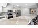 Bright kitchen features stainless steel appliances, stone countertops, and ample cabinet space at 1200 Country Club Dr # 2206, Largo, FL 33771
