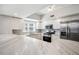 Bright, remodeled kitchen with marble countertops, stainless steel appliances and bright white cabinets at 1200 Country Club Dr # 2206, Largo, FL 33771