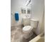 Bathroom with a vanity, toilet, tub, and gray tiled floors at 12155 Environmental Dr # 6, New Port Richey, FL 34654