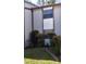 Exterior shot of a condominium unit with horizontal siding and shrubbery adorning the building at 12155 Environmental Dr # 6, New Port Richey, FL 34654