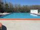 Large community pool offers a refreshing escape, perfect for hot days at 12155 Environmental Dr # 6, New Port Richey, FL 34654