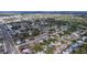 Aerial view of a residential neighborhood with tree-lined streets and easy access to roadways at 1216 Lotus Path, Clearwater, FL 33756