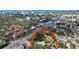 Neighborhood aerial view shows proximity to commercial and urban areas at 1216 Lotus Path, Clearwater, FL 33756