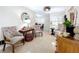 Bright and airy living room with comfortable seating, attractive decor, and an inviting ambiance at 1216 Lotus Path, Clearwater, FL 33756