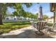 Relax on the paved patio with outdoor seating and a beautiful backyard view at 12200 Vonn Rd # 6D, Largo, FL 33774