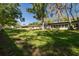 Well-maintained backyard and lush landscaping enhance the property's appeal at 12200 Vonn Rd # 6D, Largo, FL 33774