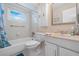 Bathroom with tub and vanity at 12200 Vonn Rd # 6D, Largo, FL 33774