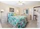 Lovely bedroom featuring a sliding closet, a window and a dresser at 12200 Vonn Rd # 6D, Largo, FL 33774