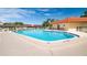 Large community pool with ample seating and well-maintained surroundings at 12200 Vonn Rd # 6D, Largo, FL 33774