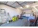This garage features a washer, dryer, sink, storage cabinets, and work space at 12200 Vonn Rd # 6D, Largo, FL 33774