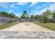 Covered pool area in backyard needing TLC at 12704 128Th Ln, Largo, FL 33774