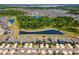 This beautiful neighborhood with large lakes has many homes with well maintained lawns and mature trees at 14618 Scottburgh Glen Dr, Wimauma, FL 33598