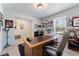 Office featuring a window, desk and decor at 14618 Scottburgh Glen Dr, Wimauma, FL 33598