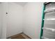 Unfinished basement area with concrete walls and a ladder at 2087 Hunters Glen Dr # 126, Dunedin, FL 34698