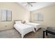 Bright bedroom featuring two twin beds, large windows and neutral colored walls at 2087 Hunters Glen Dr # 126, Dunedin, FL 34698