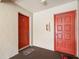 Hallway showing entry door to unit and storage room at 2087 Hunters Glen Dr # 126, Dunedin, FL 34698