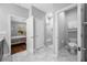 Bathroom featuring tile floors, a vanity, a toilet, and a walk-in shower at 2270 Spring Lake Ct, Clearwater, FL 33763