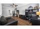 Comfortable living room featuring tile flooring, couch, and built in shelving at 2270 Spring Lake Ct, Clearwater, FL 33763