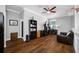 Comfortable living room featuring tile flooring, couch, and built in shelving at 2270 Spring Lake Ct, Clearwater, FL 33763