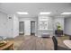 A communal seating area featuring a laundry room, textured wall paneling, and a built-in shelving unit at 2401 Bayshore Blvd # Cu1, Tampa, FL 33629