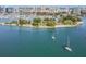 Aerial view showcasing the coastline, city skyline, and sailboats on the water at 2500 Boone Ct, Sarasota, FL 34237