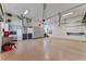 Spacious garage featuring storage cabinets and a durable epoxy floor at 2633 N Dundee St, Tampa, FL 33629