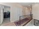 Hallway with laundry room access featuring modern appliances and ample storage space at 2633 N Dundee St, Tampa, FL 33629